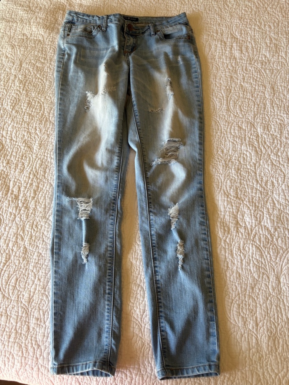 Women’s Light Blue Ripped Skinny Jeans
